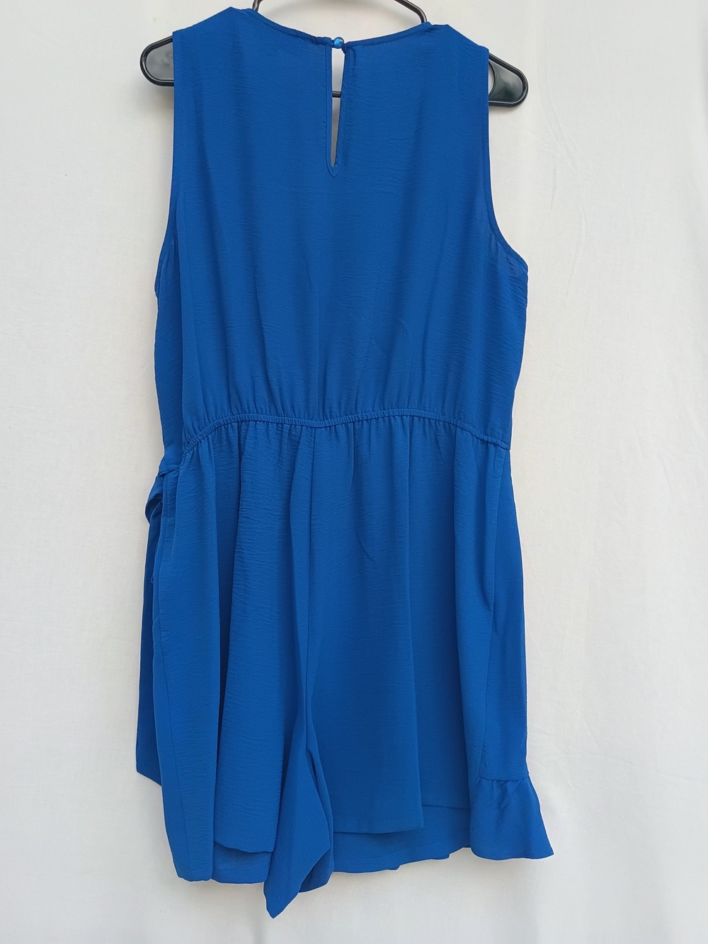 Emma & Michele Royal Blue Sleeveless Wrap Mini Romper with Ruffle Hem - Picture 2 of 5